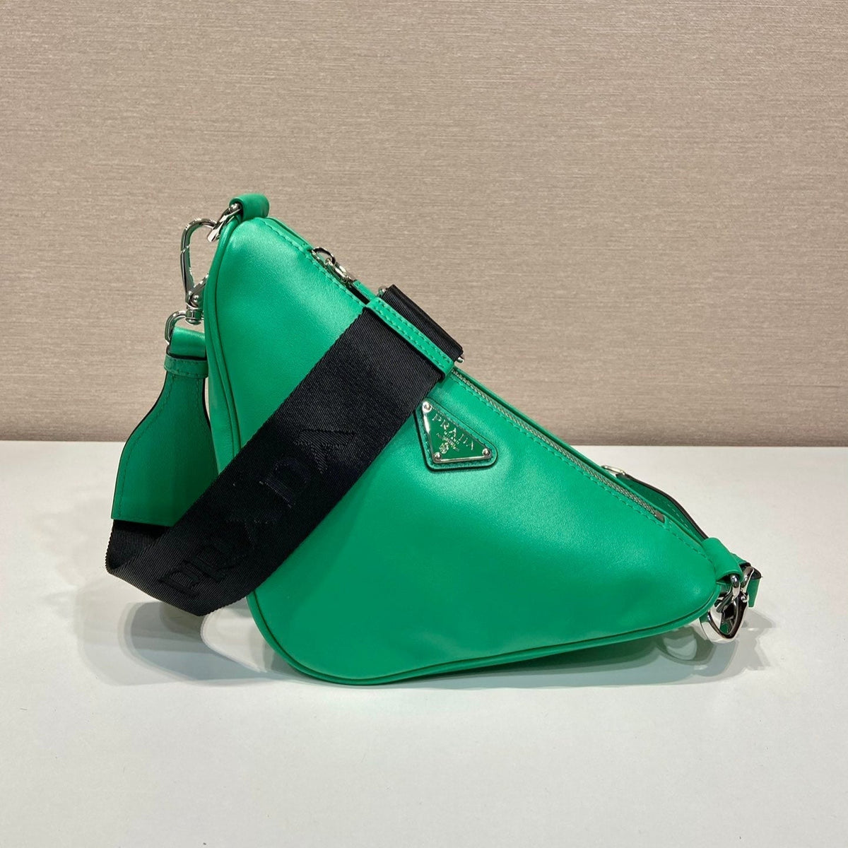 PRADA TRIANGULAR BAG 27 IN GO GREEN SMOOTH LAMBSKIN
