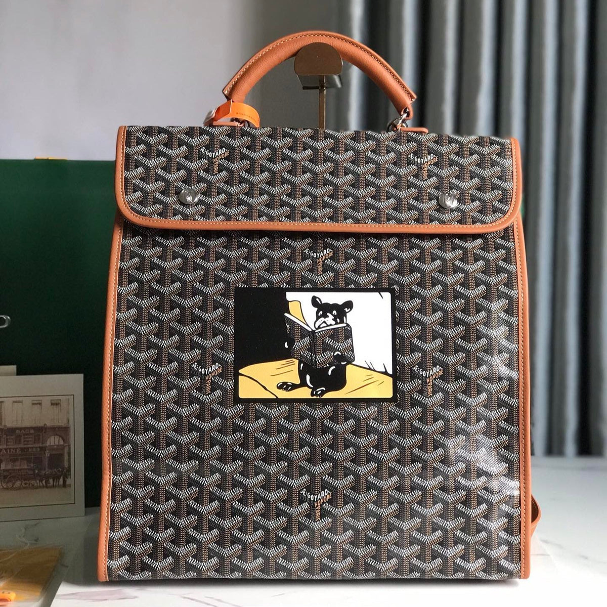 GOYARD SAINT LÉGER BACKPACK 35 IN BROWN GOYARDINE CANVAS AND CALFSKIN WITH CARTOON PATCH