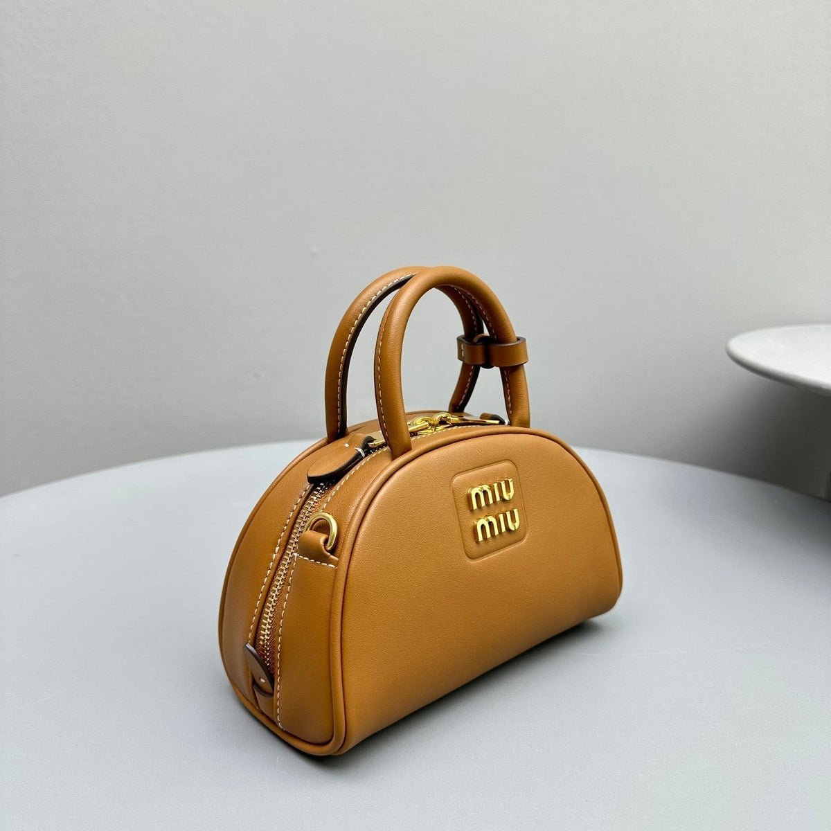 MIU MIU TOP-HANDLE 18 BAG IN CARAMEL BROWN CALFSKIN