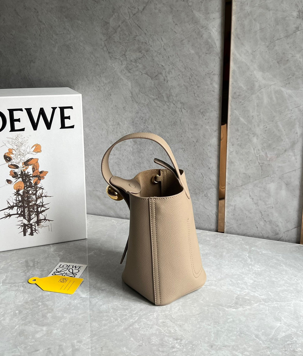 LOEWE LOE MINI 19 PEBBLE BUCKET IN CAMEL BROWN MELLOW CALFSKIN