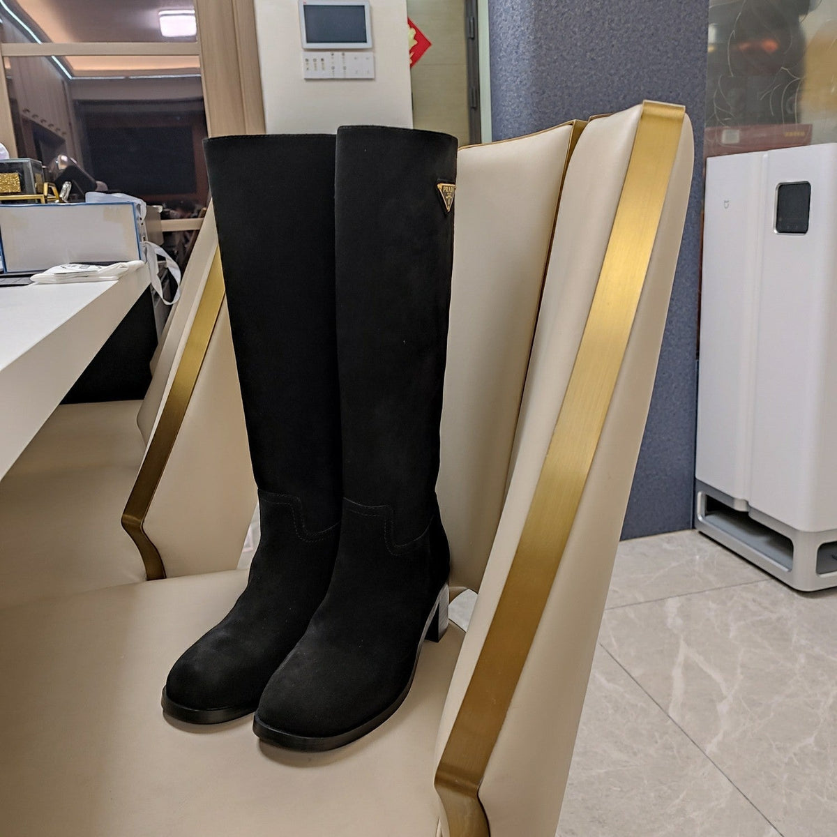 PRADA KNEE BOOTS WITH TRIANGLE LOGO IN BLACK SUEDE