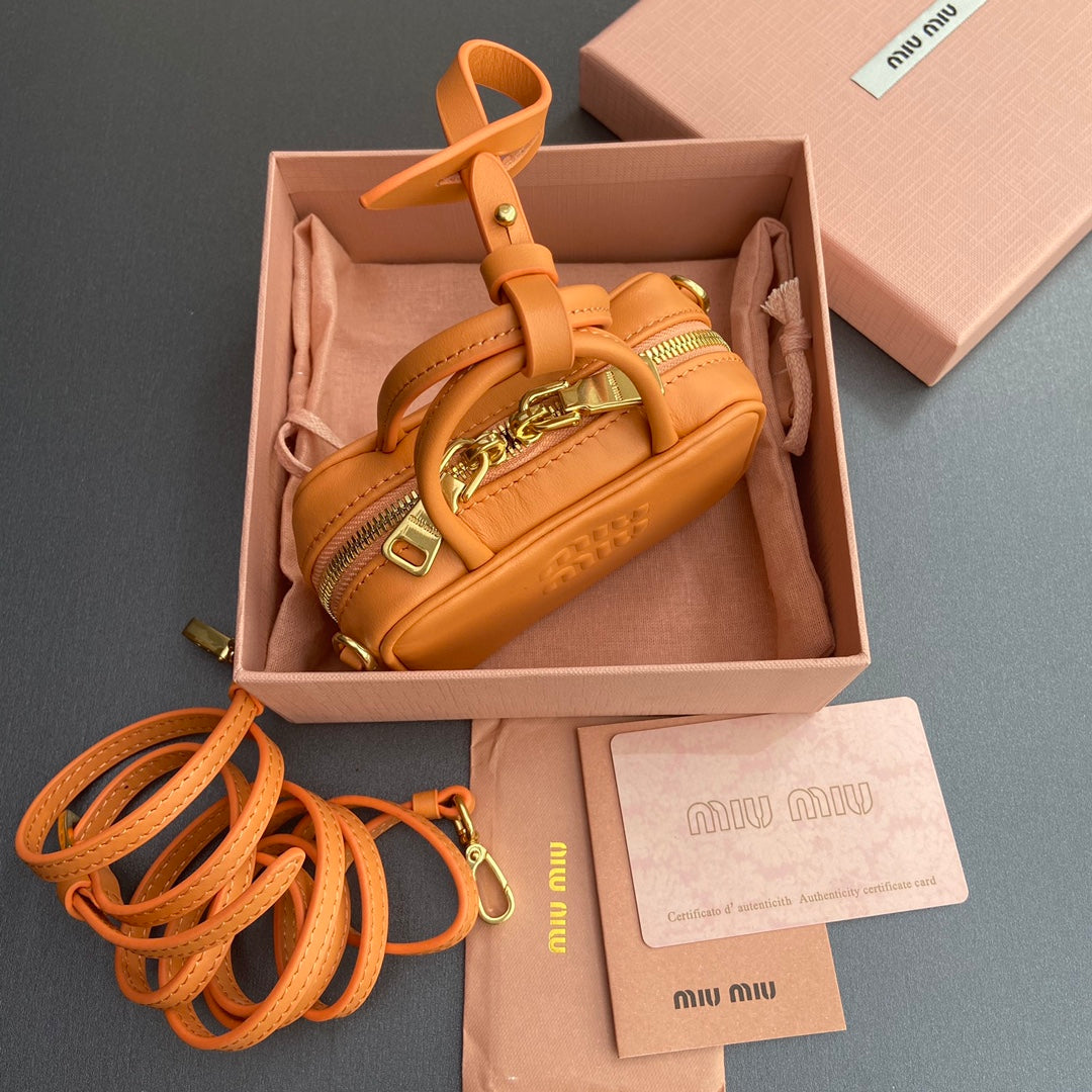 MIU MIU MICRO BAG KEYCHAIN 11 IN HOT CINNAMON ORANGE CALFSKIN EMBOSSED LOGO