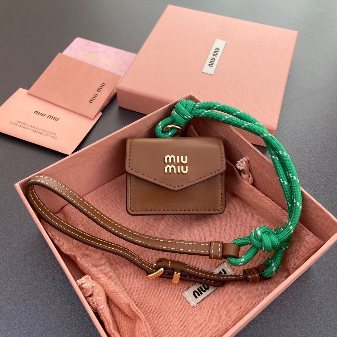 MIU MIU MICRO BAG 7 IN TAWNY BROWN SMOOTH LAMBSKIN GREEN STRAP