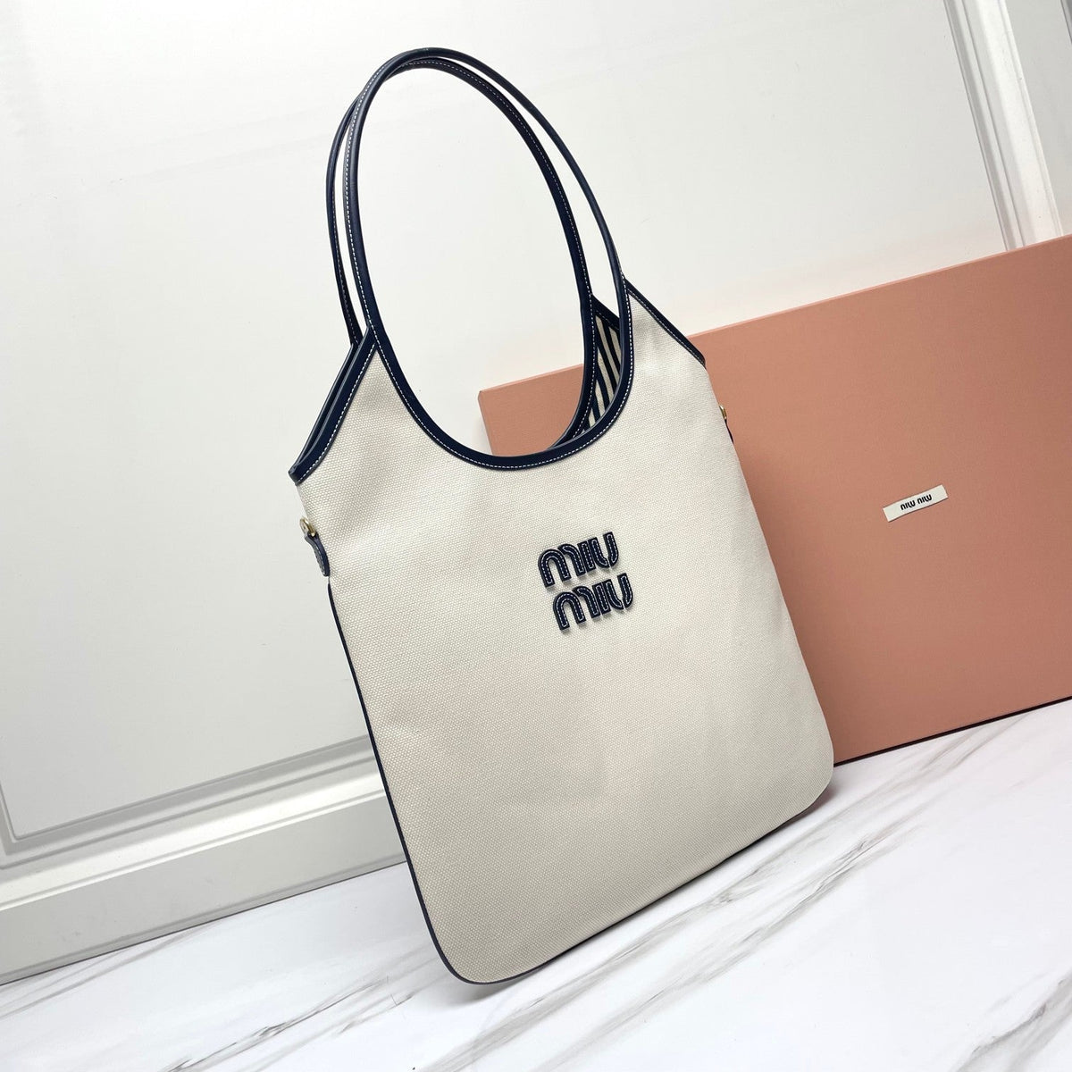 MIU MIU IVY TOTE BAG 40 IN WHITE CANVAS AND NAVY LEATHER TRIM