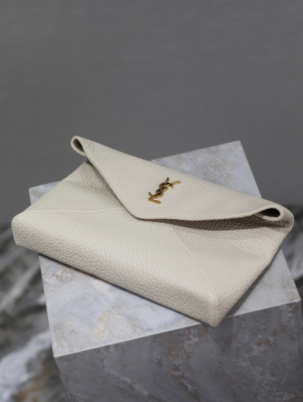 SAINT LAURENT ENVELOPE CLUTCH 29 IN WHITE LAMBSKIN COPPER LOGO