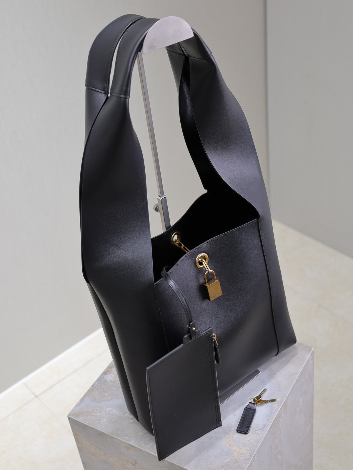 SAINT LAURENT TANGER HOBO BAG 27 IN BLACK CALFSKIN