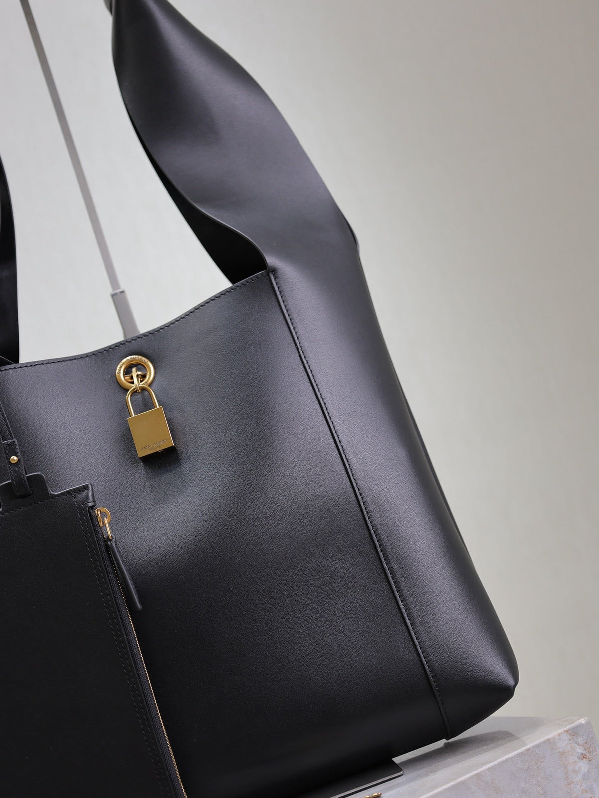 SAINT LAURENT TANGER HOBO BAG 27 IN BLACK CALFSKIN