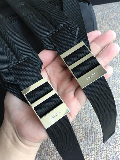 PRADA TRIANGLE LOGO BACKPACK 40 IN BLACK RE-NYLON