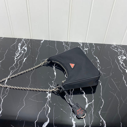 PRADA HOBO 22 BAG IN BLACK RE-NYLON WITH RED LOGO