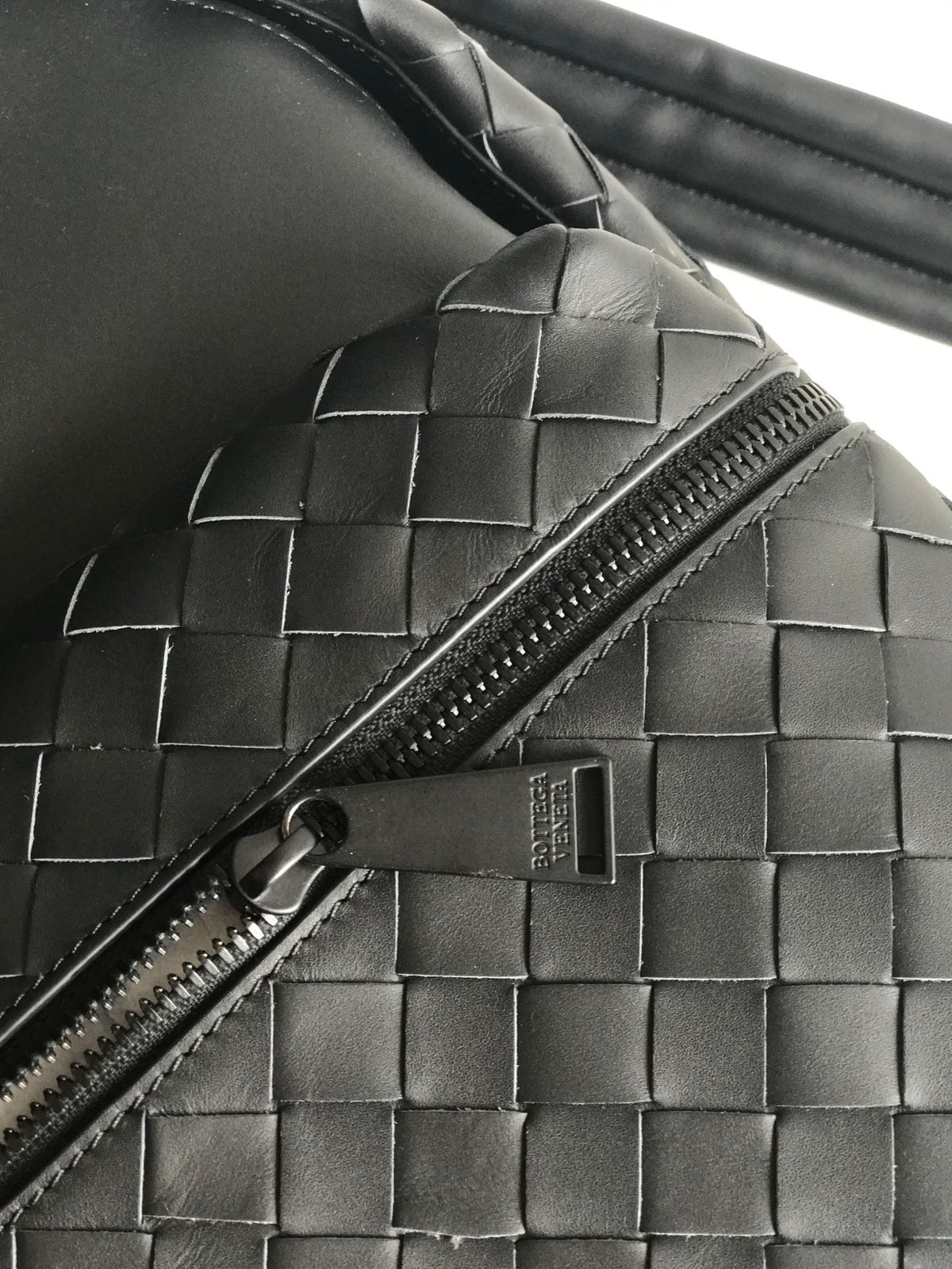 BOTTEGA VENETA SMALL INTRECCIATO 41 BACKPACK IN BLACK CALFSKIN