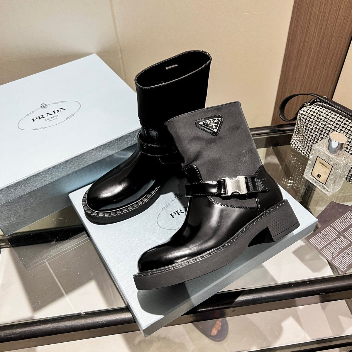 PRADA ANKLE BOOTS WITH STRAP IN BLACK CALFSKIN