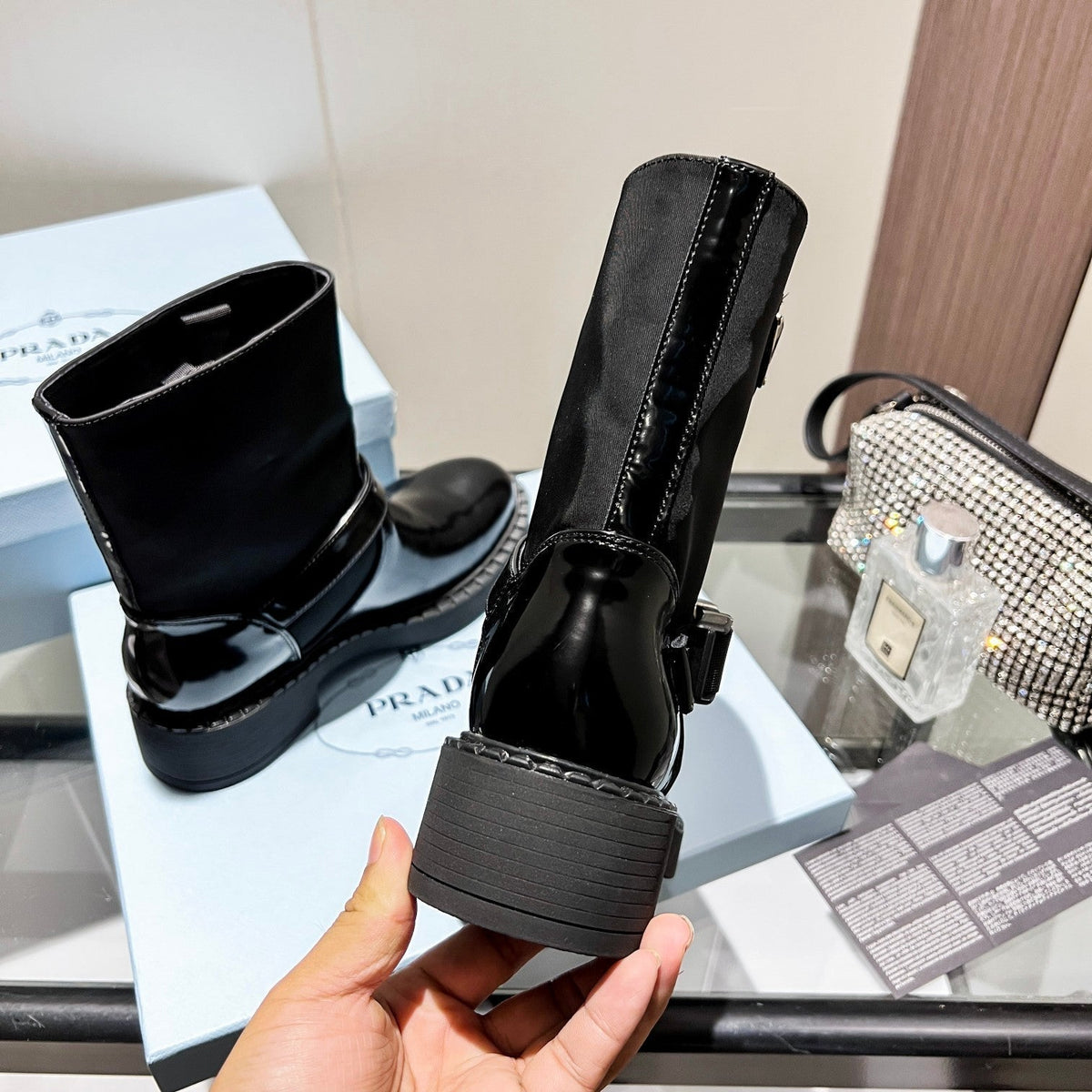 PRADA ANKLE BOOTS WITH STRAP IN BLACK CALFSKIN