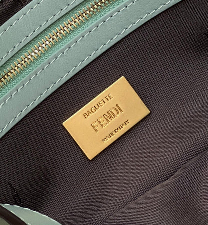 FENDI BAGUETTE WITH FF MOTIF 27 IN VIRIDIAN GREEN SOFT LAMBSKIN GOLD HARDWARE