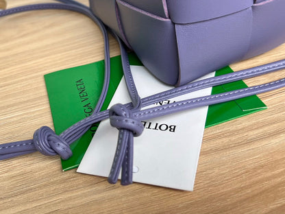 BOTTEGA VENETA SMALL CASSETTE BUCKET 18 IN ULTRA VIOLET CALFSKIN