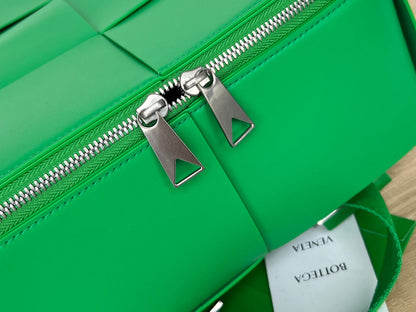 BOTTEGA VENETA WOVEN BACKPACK 34 IN EMERALD GREEN LAMBSKIN