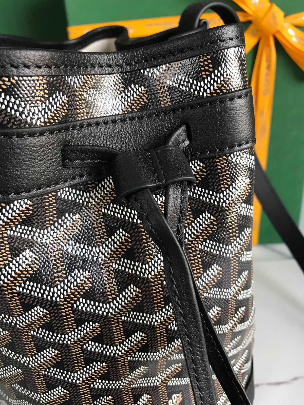 GOYARD PETIT FLOT BUCKET BAG 22 IN BLACK GOYARDINE CANVAS AND LAMBSKIN TRIM