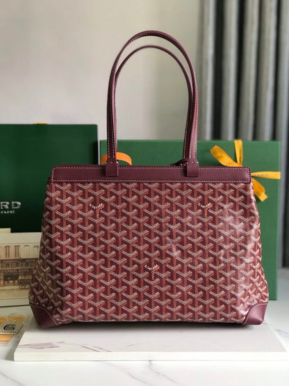 GOYARD BELLECHASSE BIAUDE PM BAG 36 IN WINE RED GOYARDINE CANVAS AND CALFSKIN TRIM