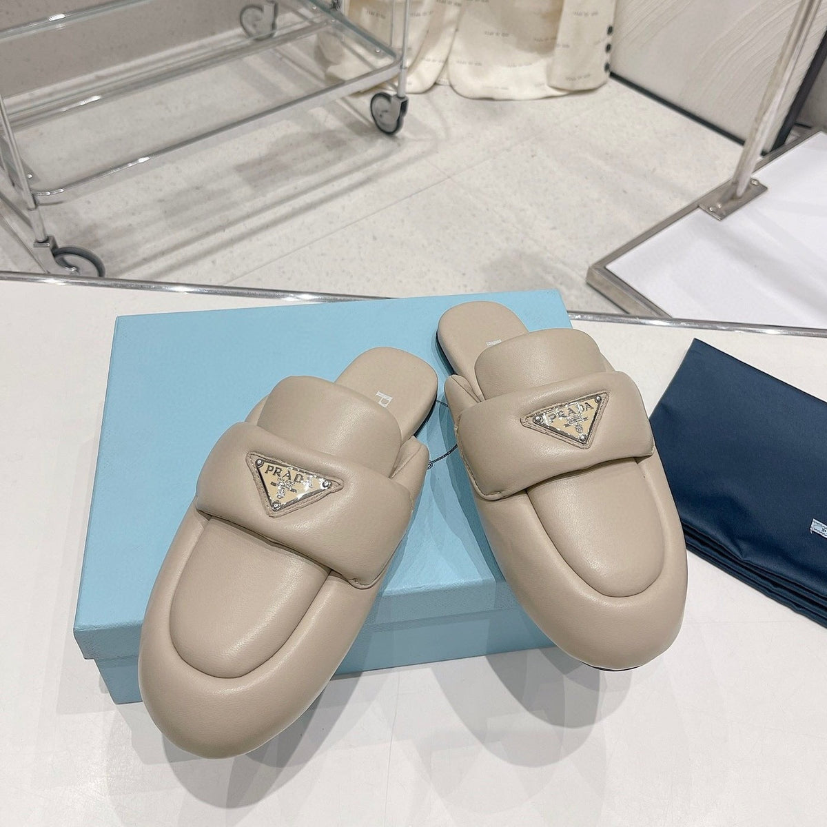 PRADA SOFT PADDED NAPPA SHEARLING MULES BEIGE LAMBSKIN