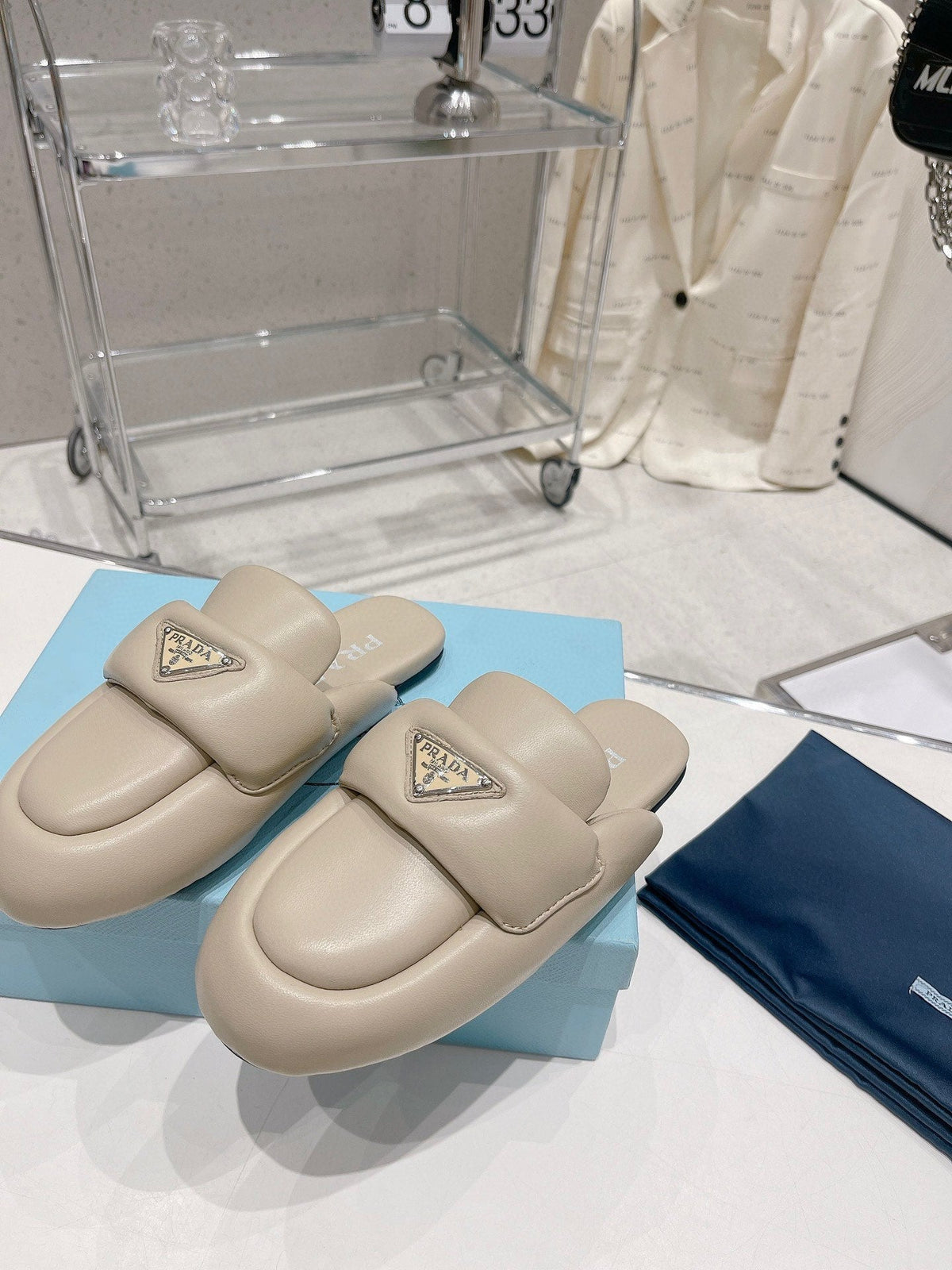 PRADA SOFT PADDED NAPPA SHEARLING MULES BEIGE LAMBSKIN
