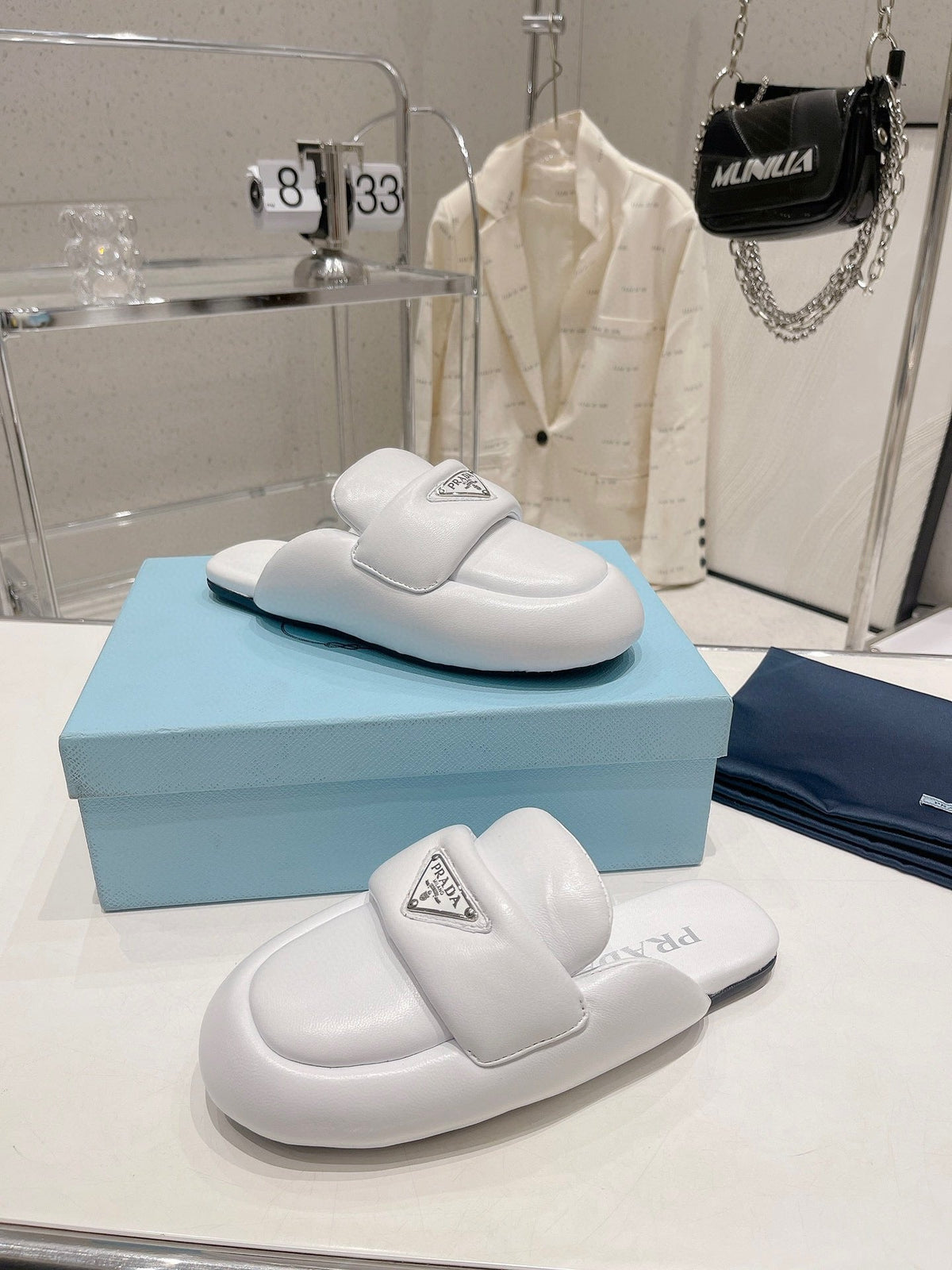 PRADA SOFT PADDED NAPPA SHEARLING MULES WHITE LAMBSKIN