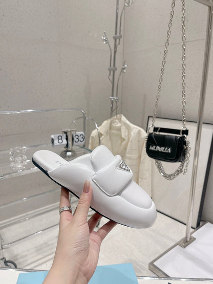 PRADA SOFT PADDED NAPPA SHEARLING MULES WHITE LAMBSKIN