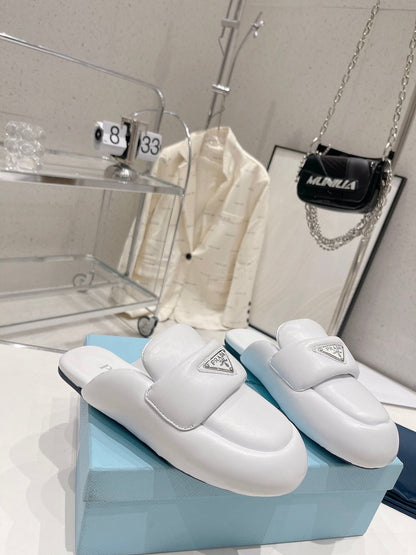 PRADA SOFT PADDED NAPPA SHEARLING MULES WHITE LAMBSKIN