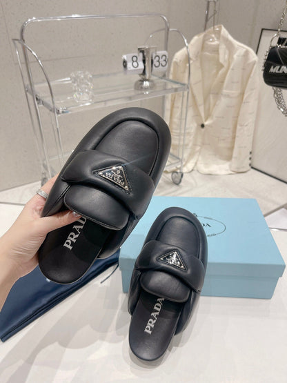 PRADA SOFT PADDED NAPPA SHEARLING MULES BLACK LAMBSKIN