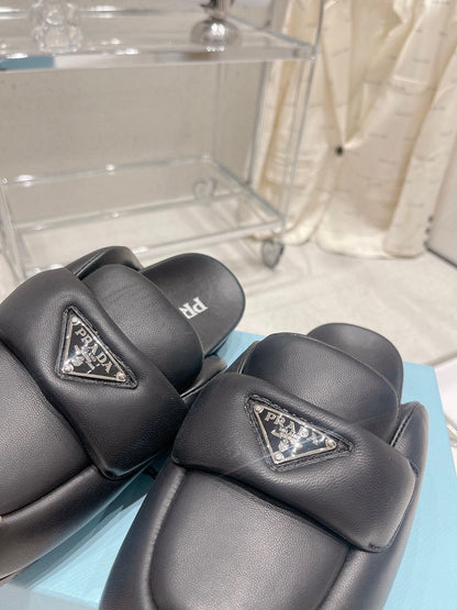 PRADA SOFT PADDED NAPPA SHEARLING MULES BLACK LAMBSKIN