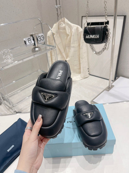 PRADA SOFT PADDED NAPPA SHEARLING MULES BLACK LAMBSKIN