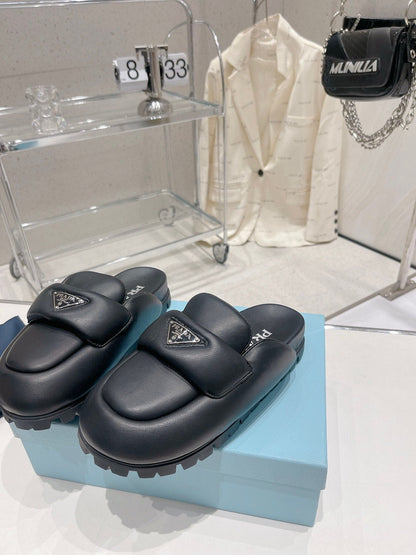 PRADA SOFT PADDED NAPPA SHEARLING MULES BLACK LAMBSKIN