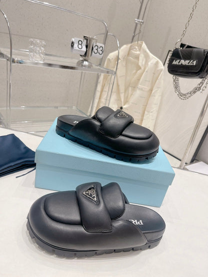 PRADA SOFT PADDED NAPPA SHEARLING MULES BLACK LAMBSKIN