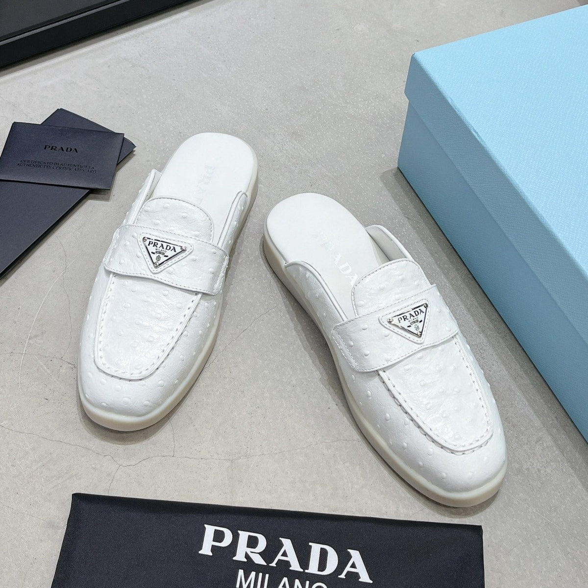 PRADA OSTRICH PATTERN MULES WHITE CALFSKIN