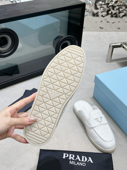 PRADA OSTRICH PATTERN MULES WHITE CALFSKIN
