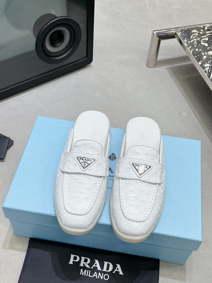 PRADA OSTRICH PATTERN MULES WHITE CALFSKIN