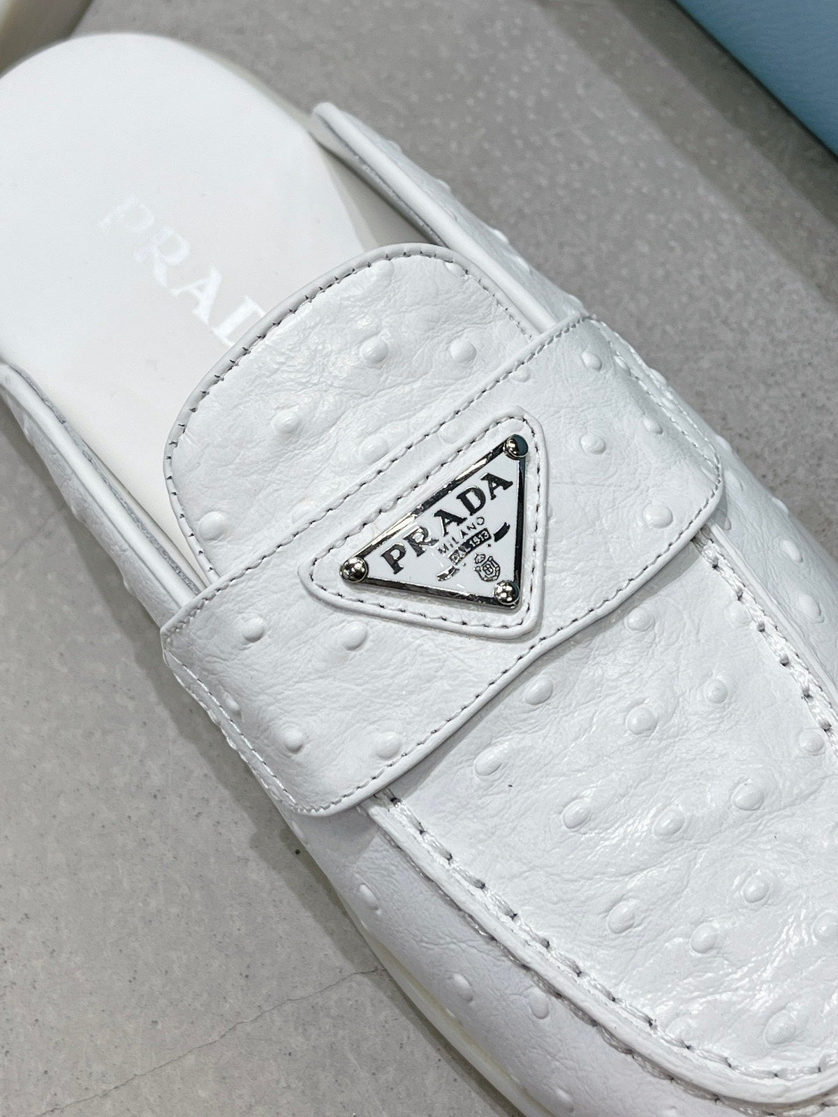 PRADA OSTRICH PATTERN MULES WHITE CALFSKIN