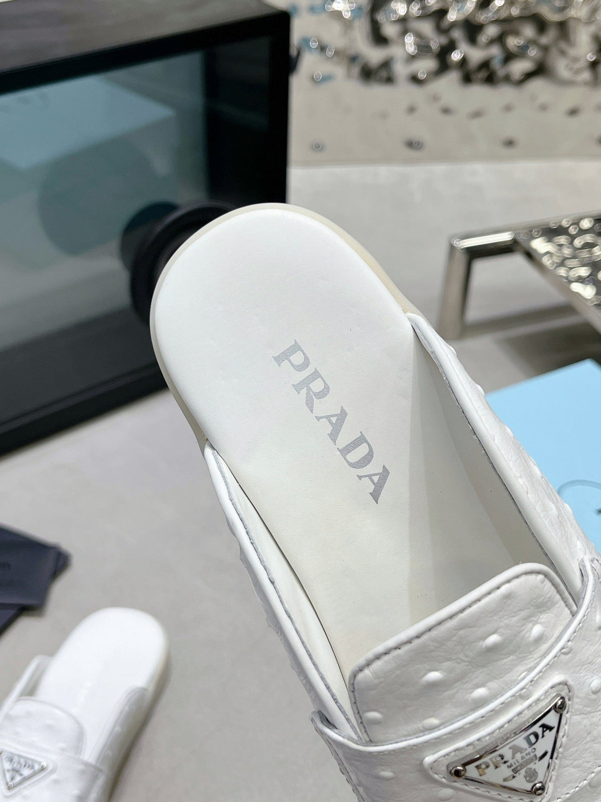 PRADA OSTRICH PATTERN MULES WHITE CALFSKIN