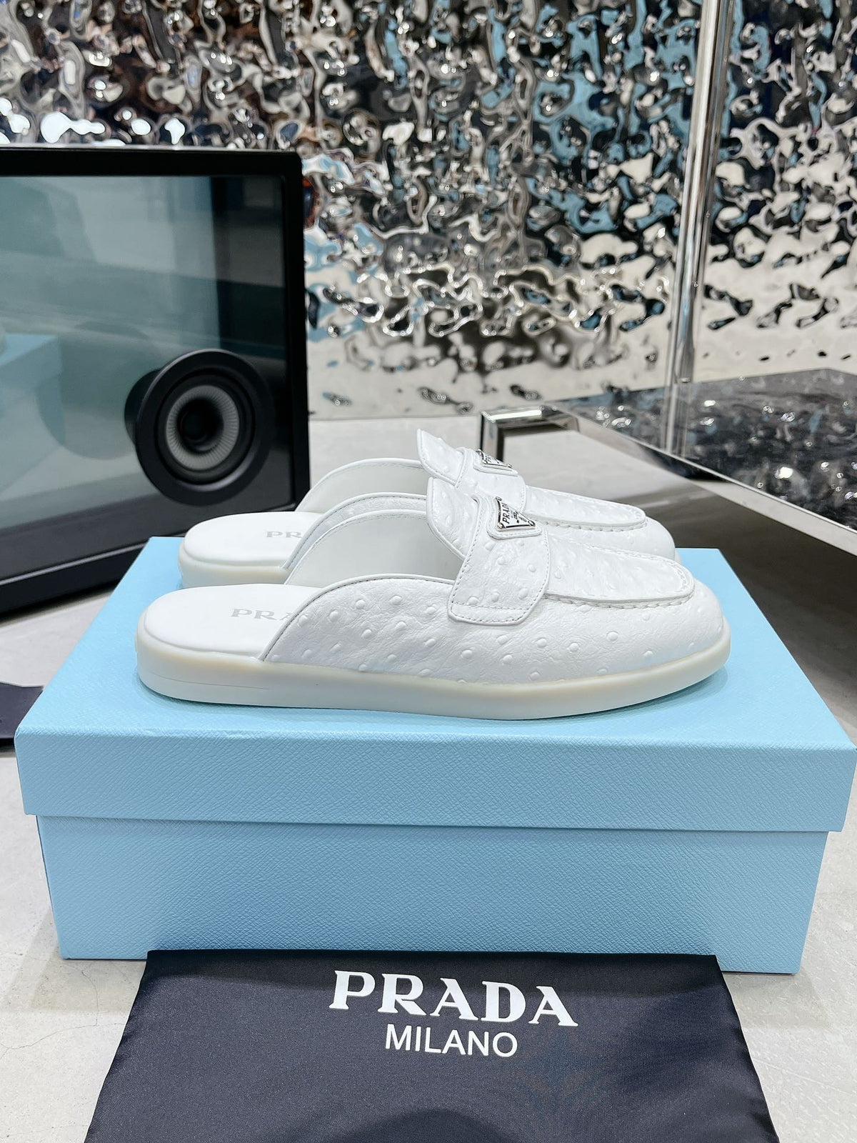 PRADA OSTRICH PATTERN MULES WHITE CALFSKIN