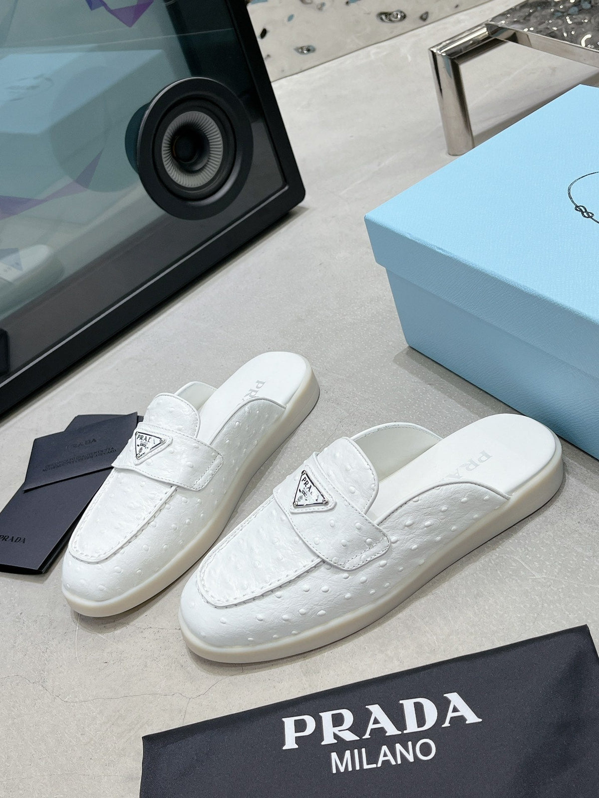 PRADA OSTRICH PATTERN MULES WHITE CALFSKIN
