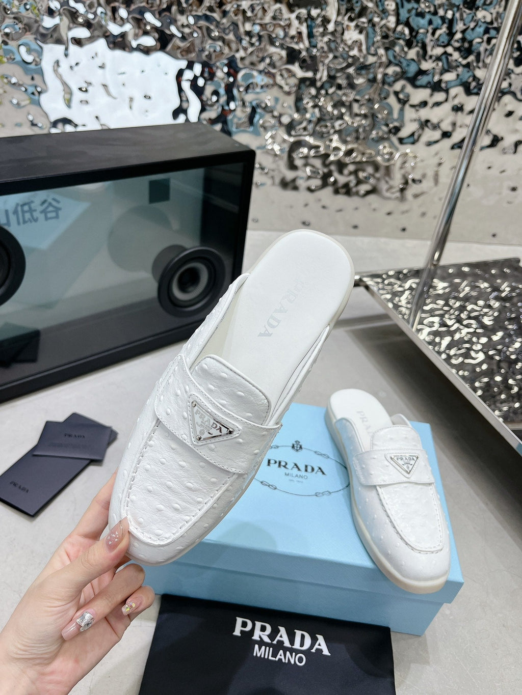 PRADA OSTRICH PATTERN MULES WHITE CALFSKIN