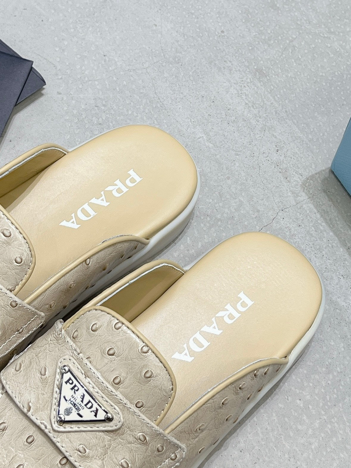 PRADA OSTRICH PATTERN MULES CREAMY WHITE CALFSKIN