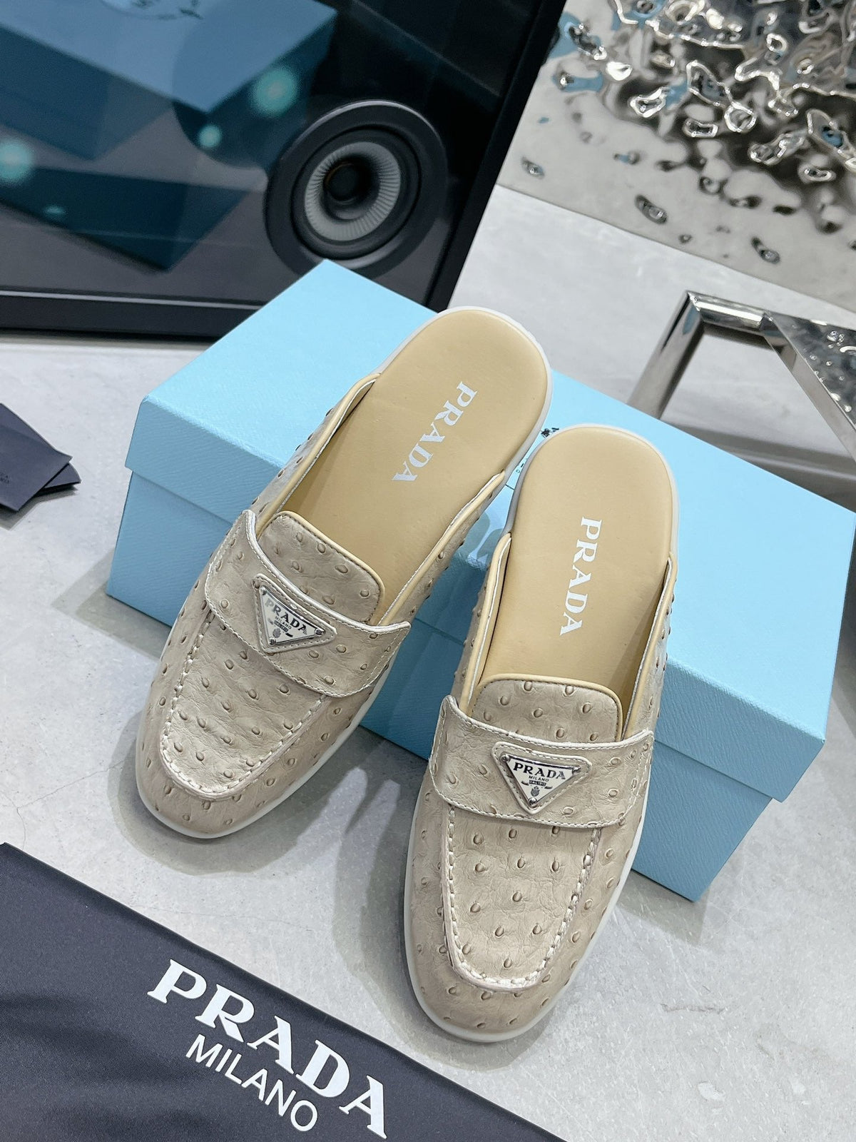 PRADA OSTRICH PATTERN MULES CREAMY WHITE CALFSKIN