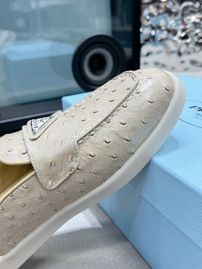 PRADA OSTRICH PATTERN MULES CREAMY WHITE CALFSKIN