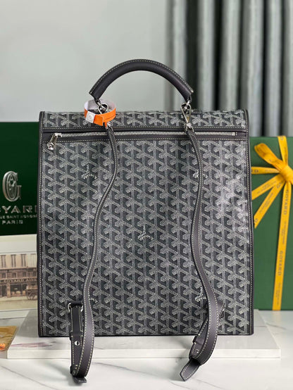 GOYARD SAINT LÉGER BACKPACK 35 IN BLACK GOYARDINE CANVAS AND CALFSKIN WITH CARTOON PATCH