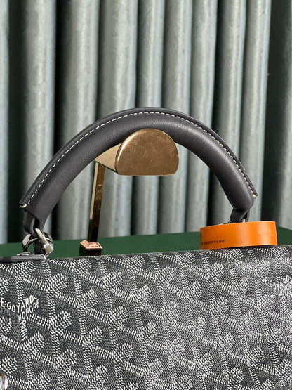 GOYARD SAINT LÉGER BACKPACK 35 IN BLACK GOYARDINE CANVAS AND CALFSKIN WITH CARTOON PATCH