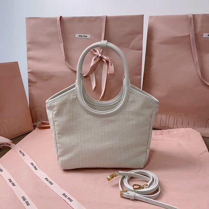 MIU MIU IVY HANDBAG 22 IN WHITE CANVAS