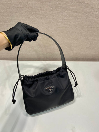 PRADA SMALL DRAWSTRING BAG 23 IN BLACK RE-NYLON