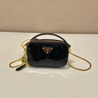 PRADA MINI HAND BAG 11 WITH GOLD STRAP IN BLACK PATENT CALFSKIN