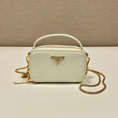 PRADA MINI HAND BAG 11 WITH GOLD STRAP IN WHITE PATENT CALFSKIN