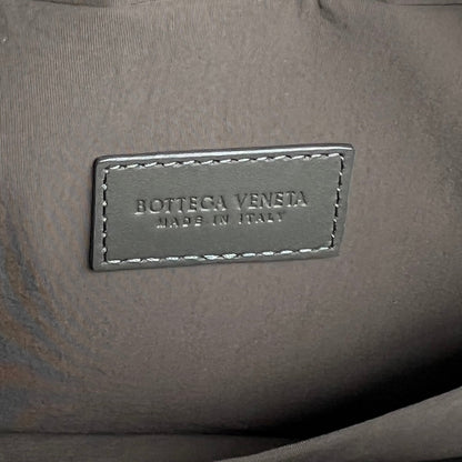 BOTTEGA VENETA INTRECCIATO CLUTCH 26 IN CORDUROY GRAY CALFSKIN