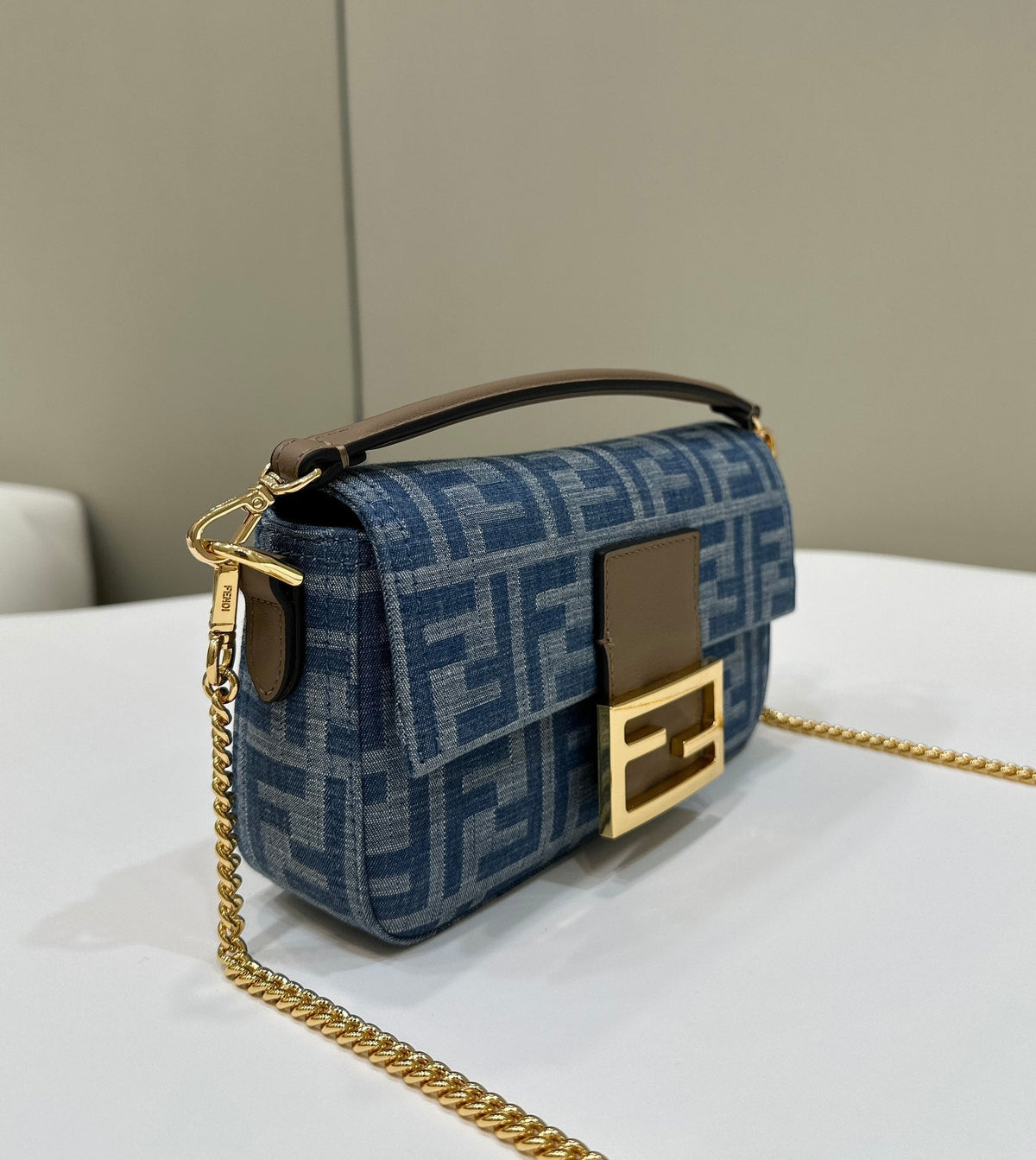 FENDI BAGUETTE MINI 19 BAG IN CERULEAN BLUE MONOGRAM DENIM WITH GOLD HARDWARE